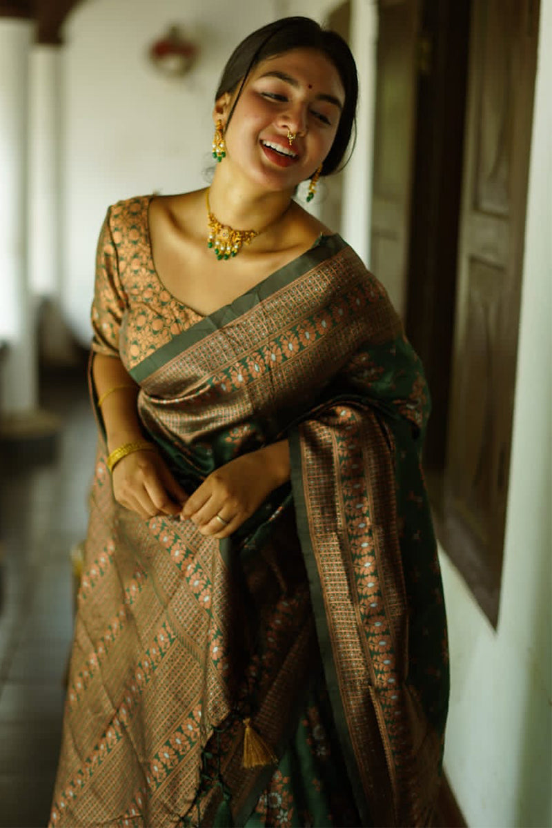 Captivating Green Soft Silk Saree With Twirling Blouse Piece - Surats Fabric