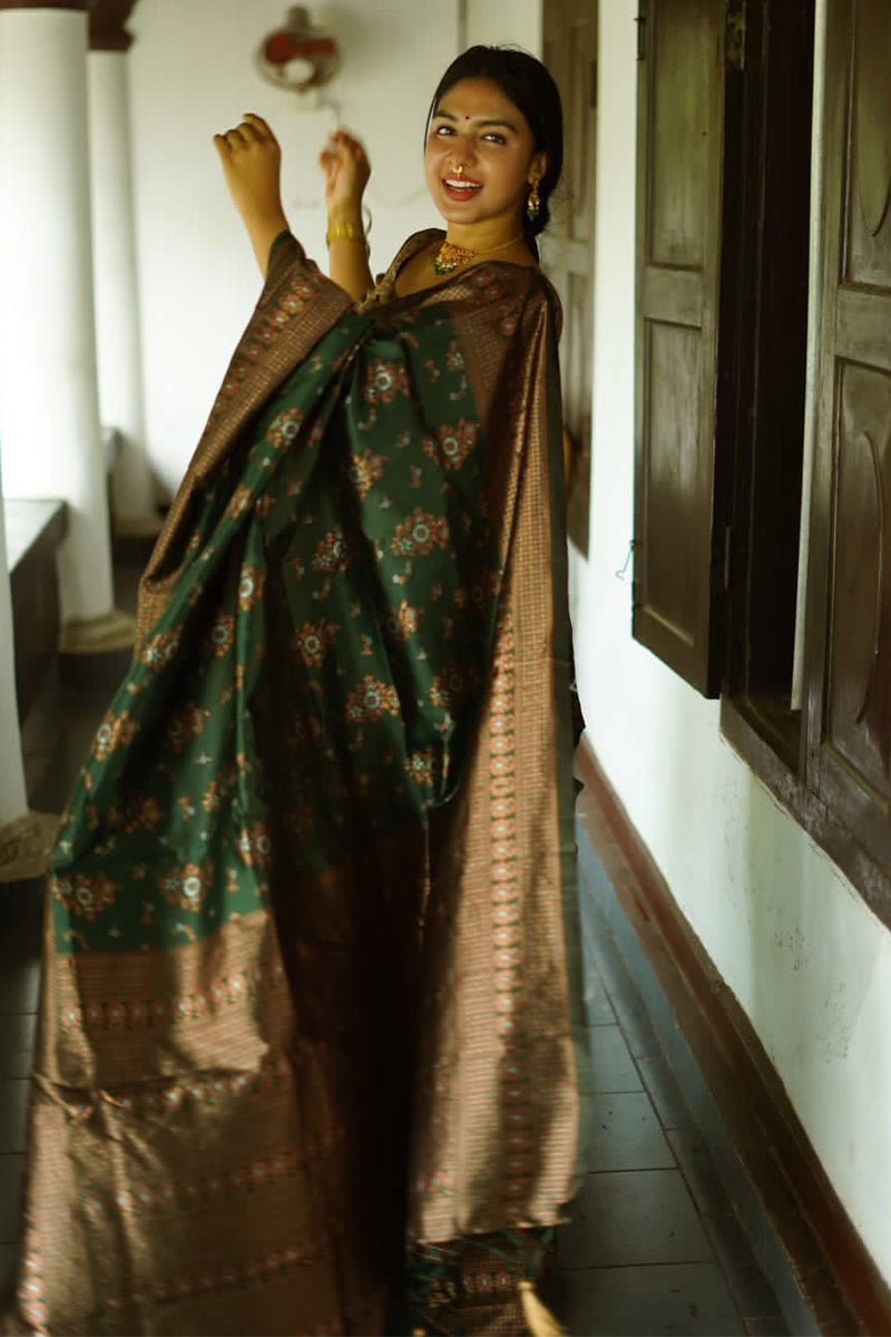 Captivating Green Soft Silk Saree With Twirling Blouse Piece - Surats Fabric