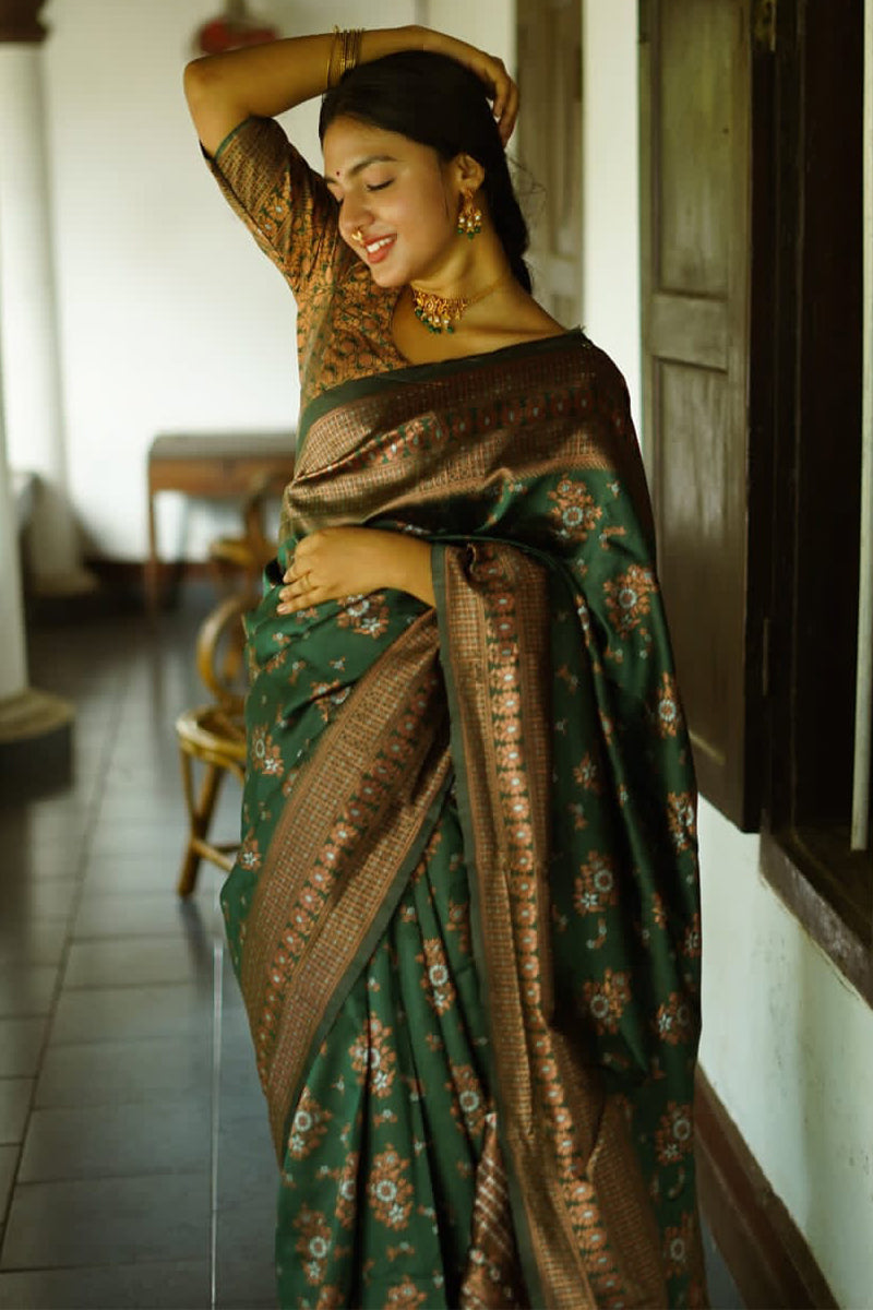 Captivating Green Soft Silk Saree With Twirling Blouse Piece - Surats Fabric