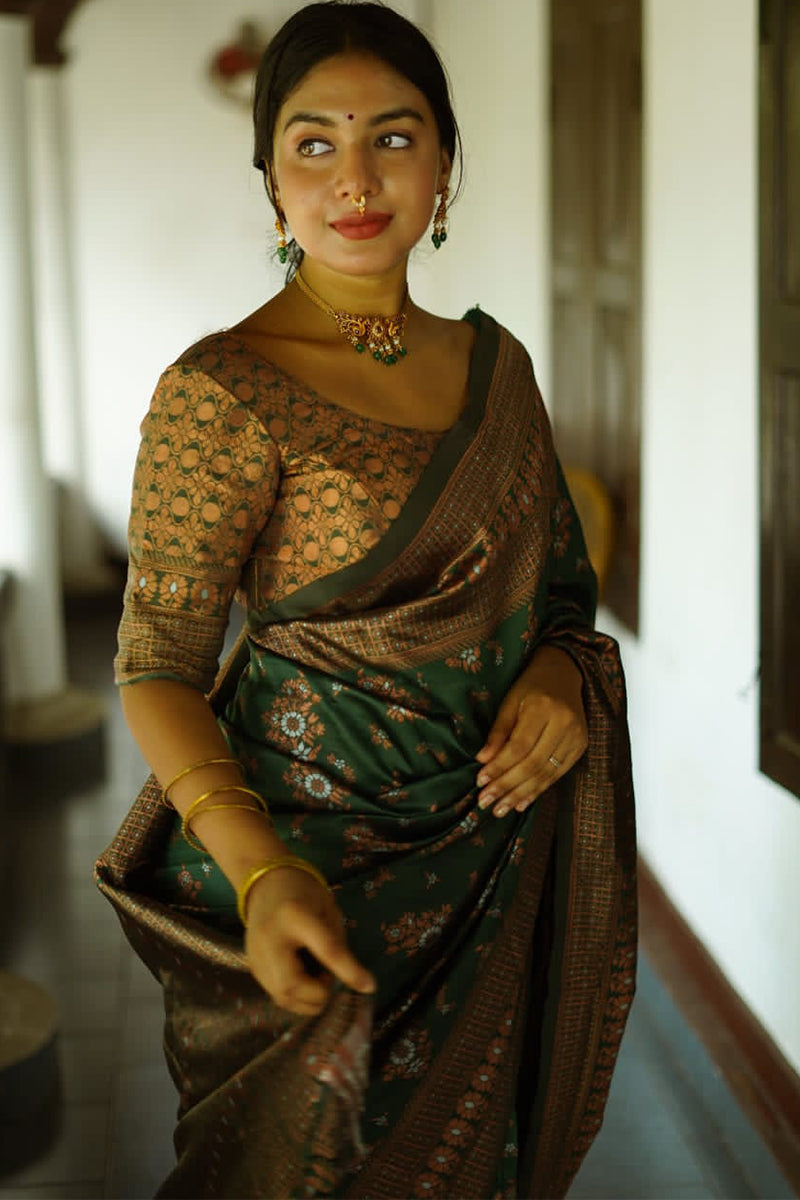 Captivating Green Soft Silk Saree With Twirling Blouse Piece - Surats Fabric
