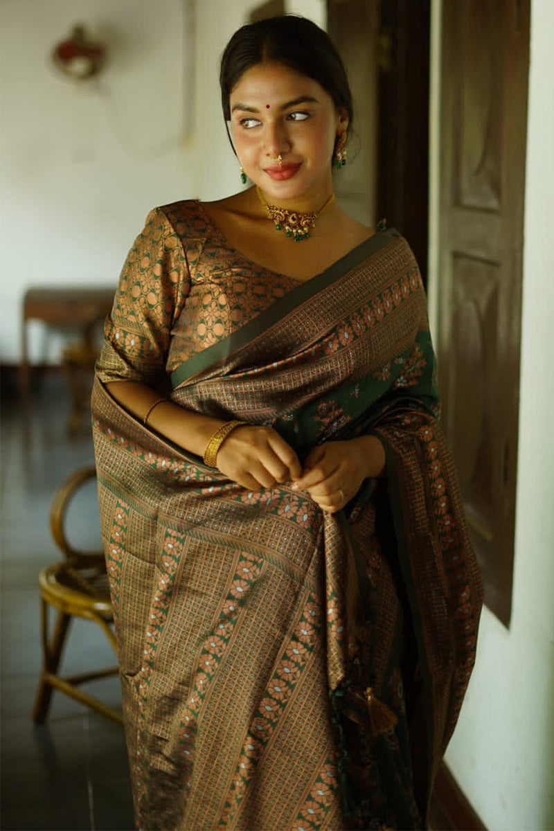 Captivating Green Soft Silk Saree With Twirling Blouse Piece - Surats Fabric