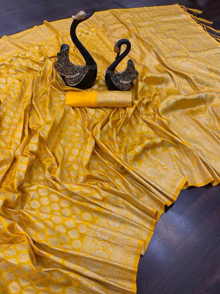 Blissful Yellow Soft Banarasi Silk Saree With Engrossing Blouse Piece - Surats Fabric