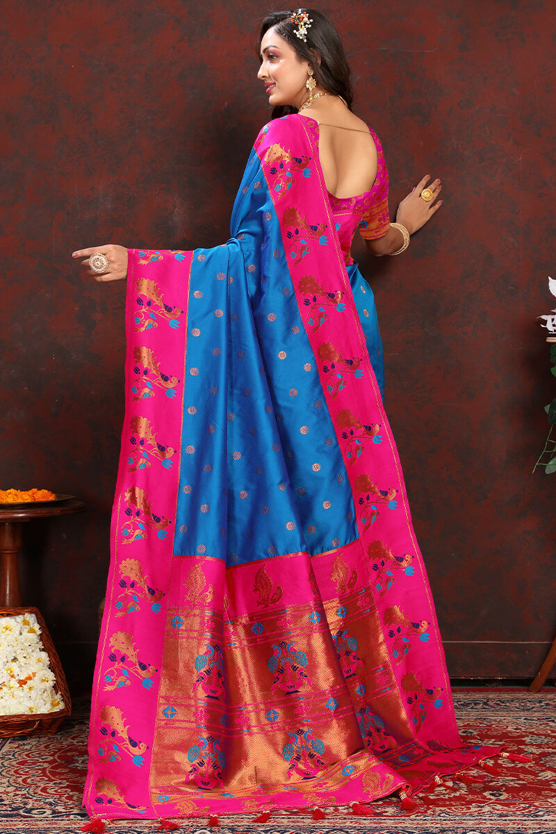Capricious Blue Paithani Silk Saree With Glowing Blouse Piece - Surats Fabric