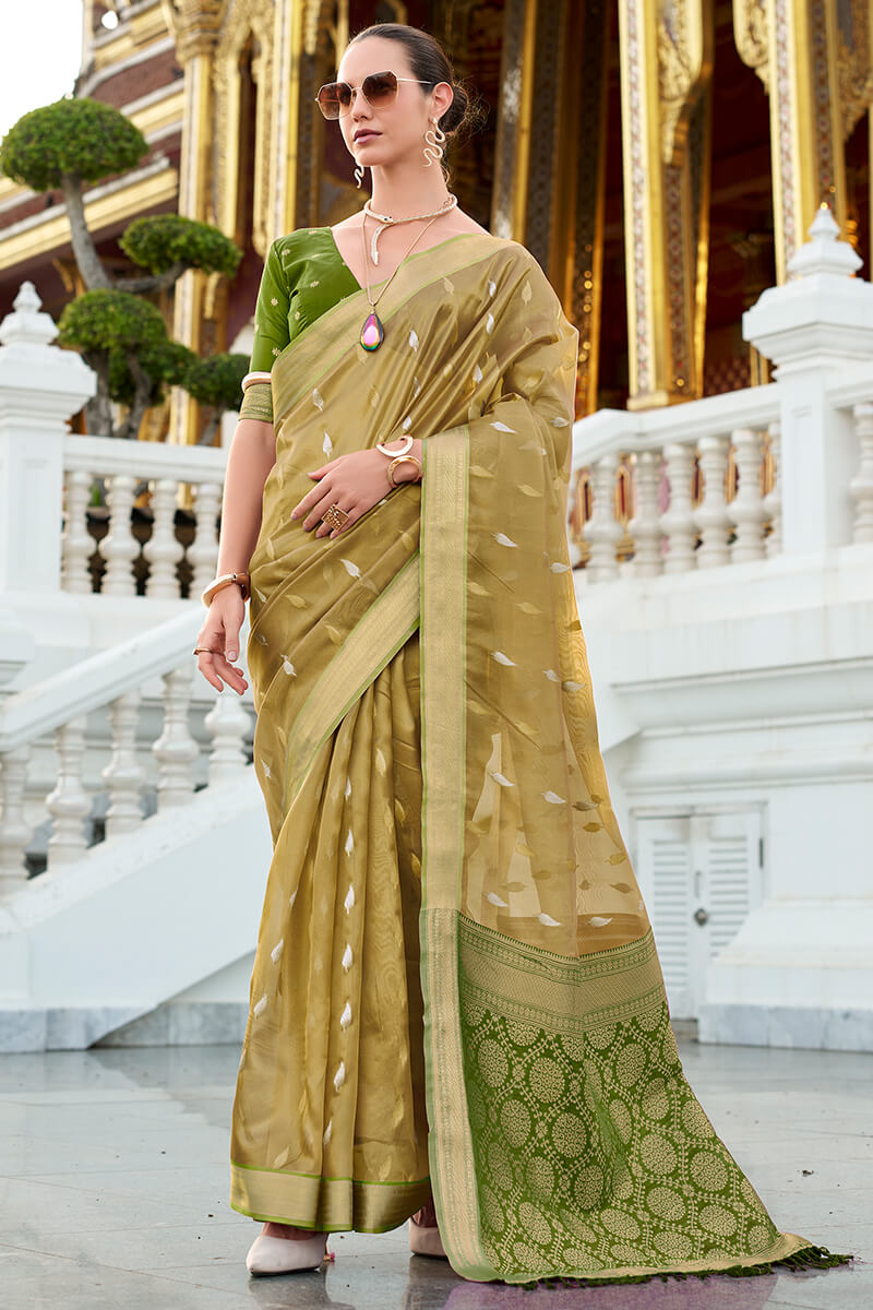 Arresting Green Soft Banarasi Silk Saree With Prettiest Blouse Piece - Surats Fabric