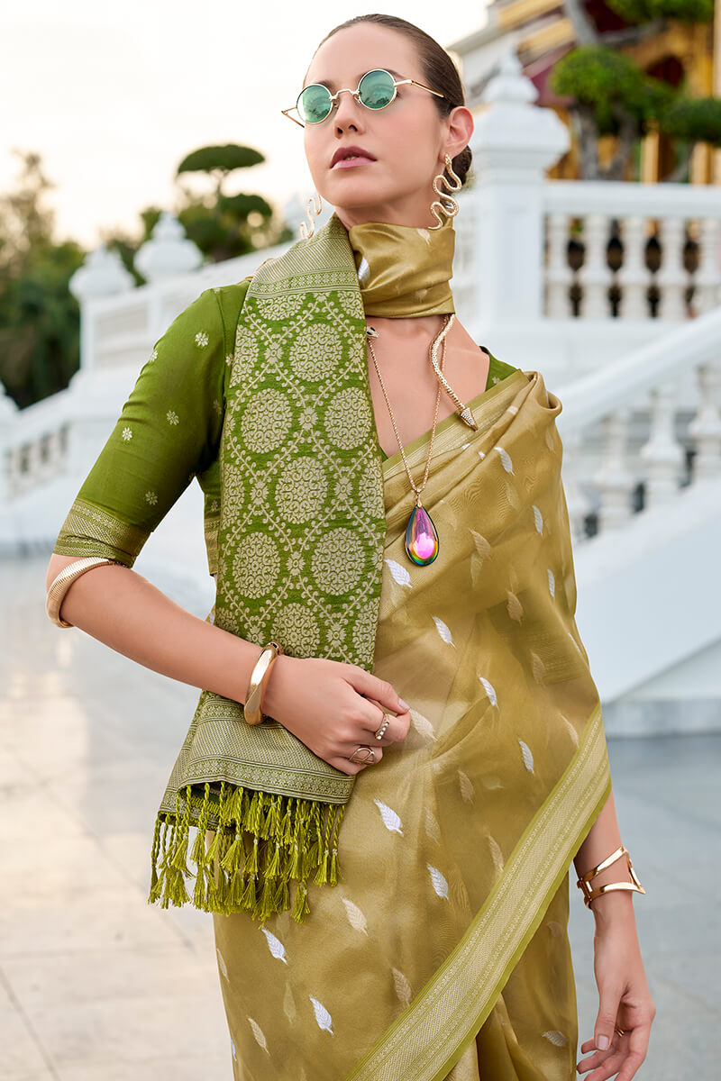 Arresting Green Soft Banarasi Silk Saree With Prettiest Blouse Piece - Surats Fabric