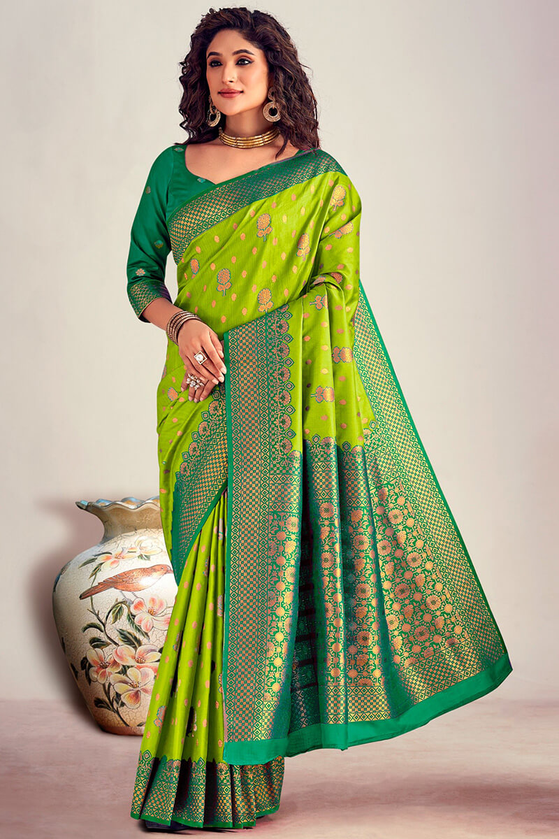Capricious Parrot Soft Banarasi Silk Saree With Beautiful Blouse Piece - Surats Fabric