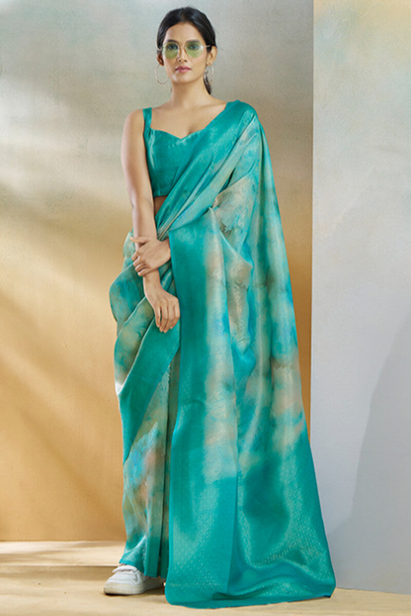 Beguiling Turquoise Digital Printed Soft Silk Saree With Alluring Blouse Piece - Surats Fabric