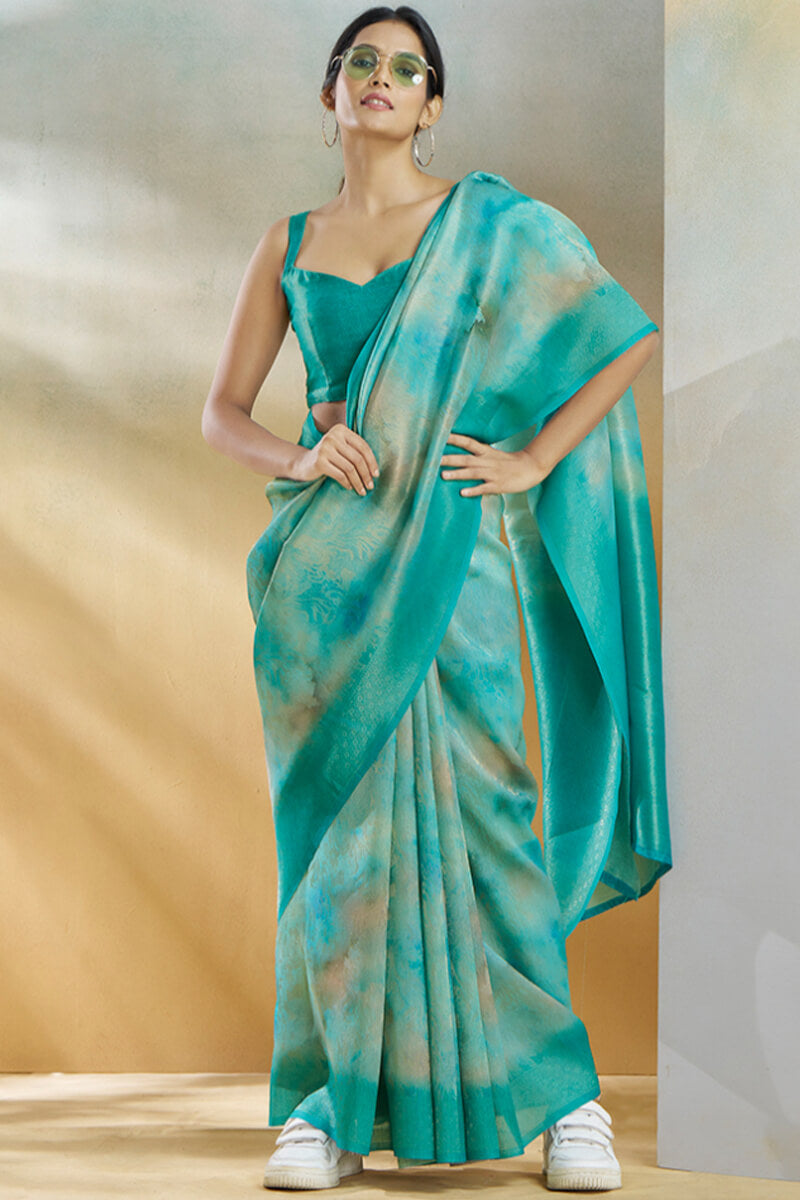 Beguiling Turquoise Digital Printed Soft Silk Saree With Alluring Blouse Piece - Surats Fabric