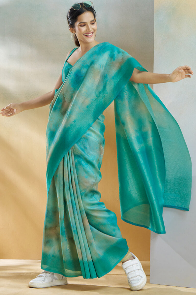 Beguiling Turquoise Digital Printed Soft Silk Saree With Alluring Blouse Piece - Surats Fabric
