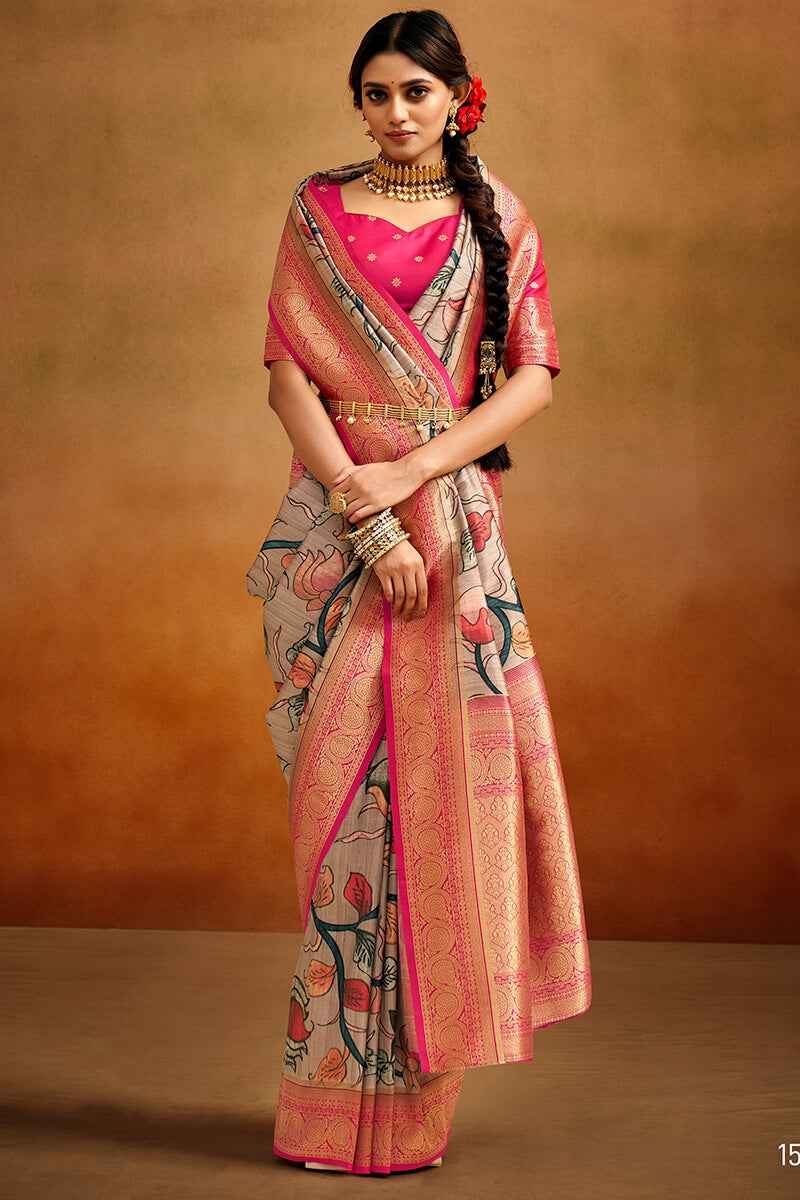 Adoring Beige Kalamkari Printed Saree With Scrupulous Blouse Piece