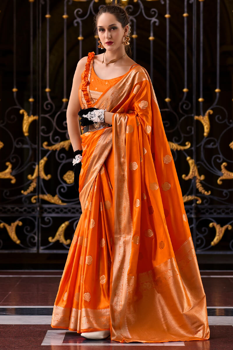 Captivating Orange Banarasi Satin Silk Saree With Desirable Blouse - Surats Fabric
