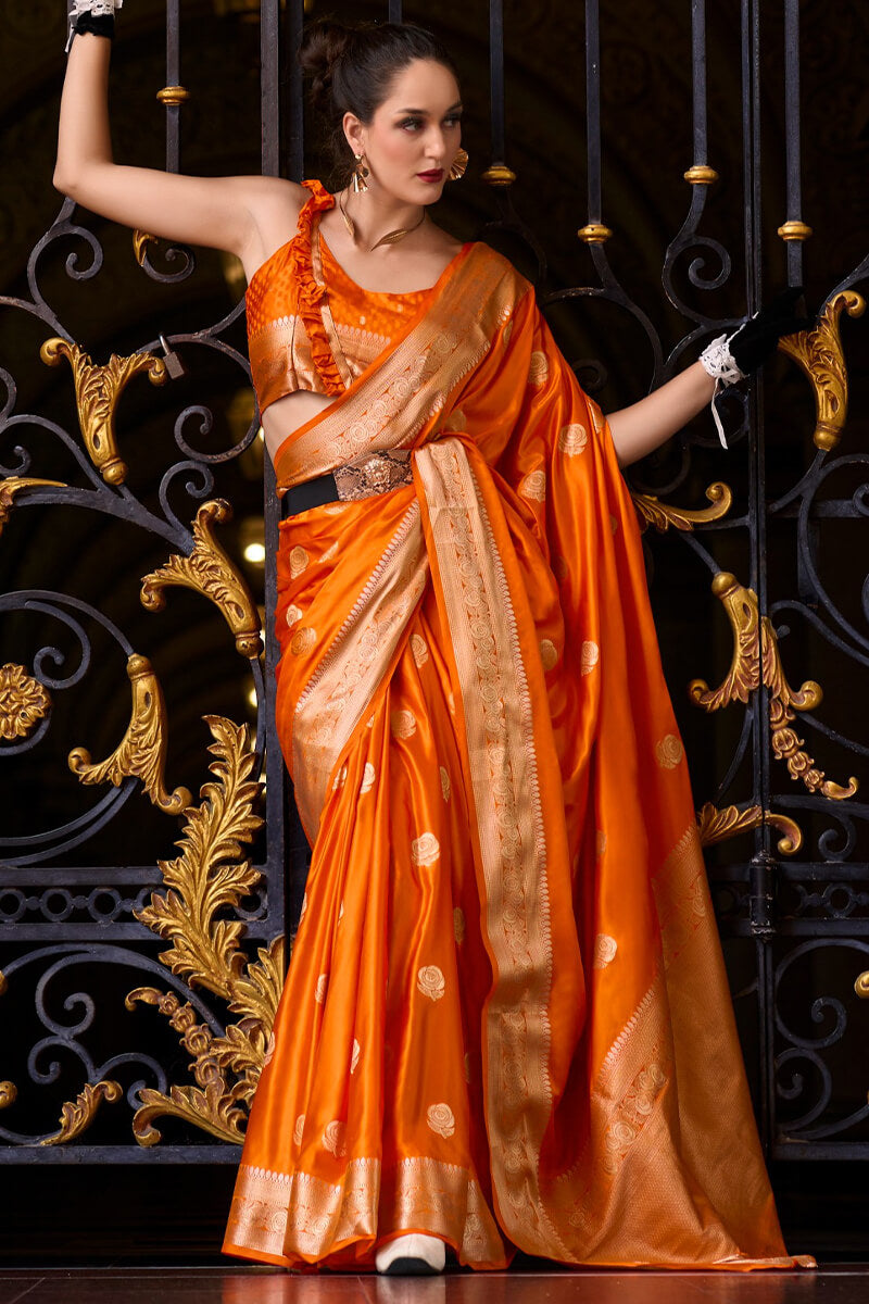 Captivating Orange Banarasi Satin Silk Saree With Desirable Blouse - Surats Fabric