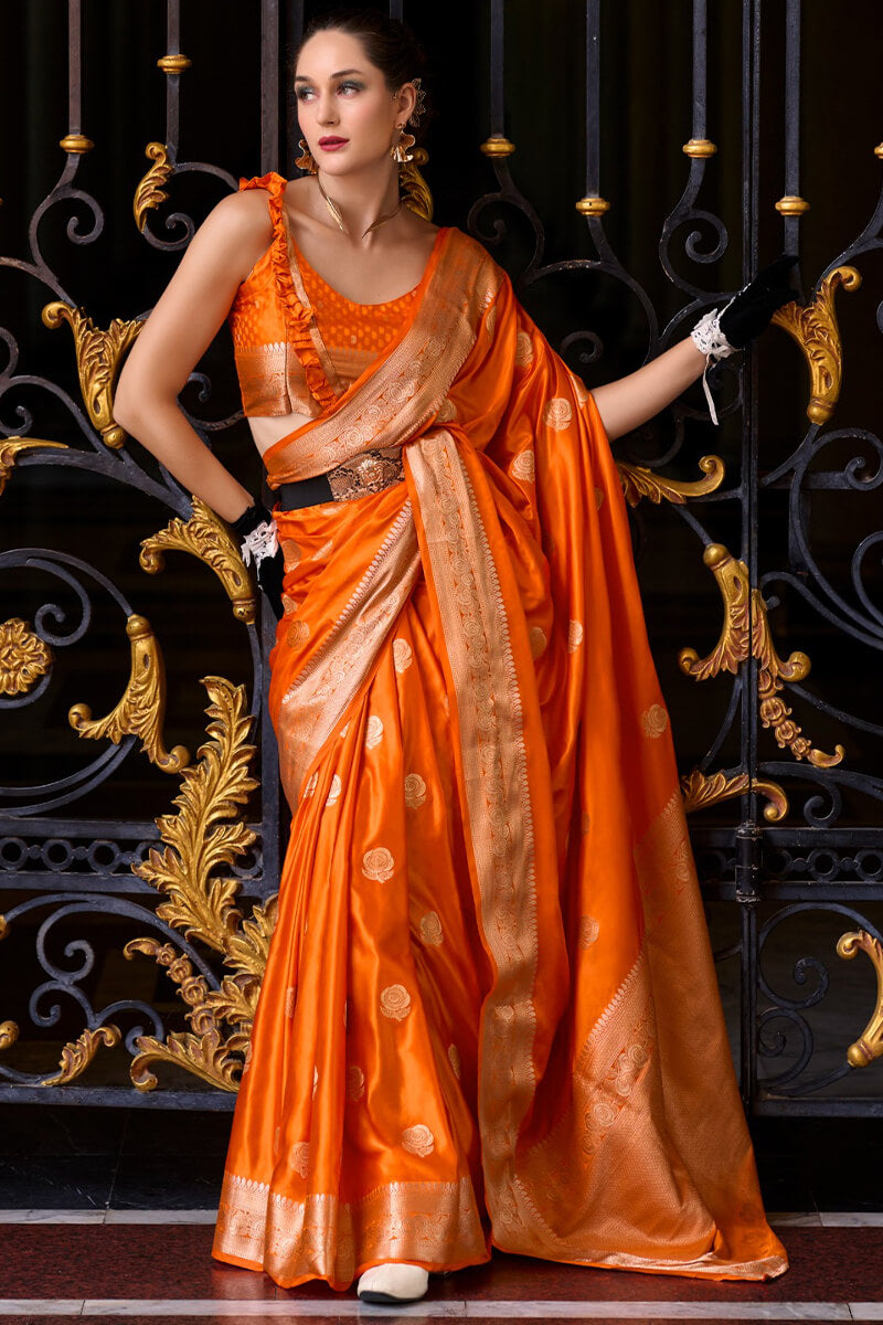 Captivating Orange Banarasi Satin Silk Saree With Desirable Blouse - Surats Fabric