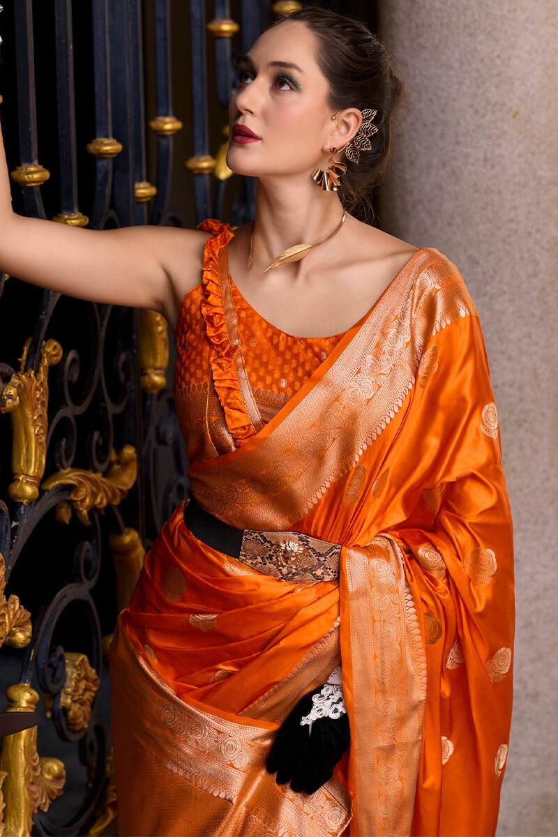 Captivating Orange Banarasi Satin Silk Saree With Desirable Blouse - Surats Fabric