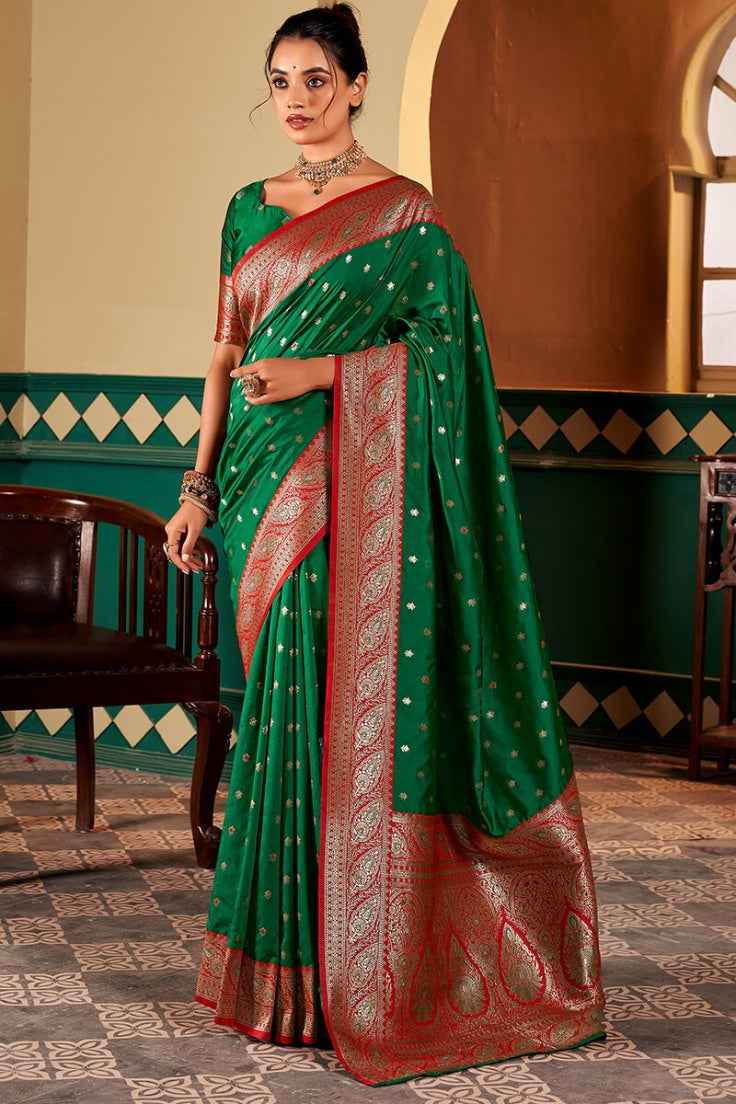 Alluring Dark Green Soft Banarasi Silk Saree With Zephyr Blouse Piece