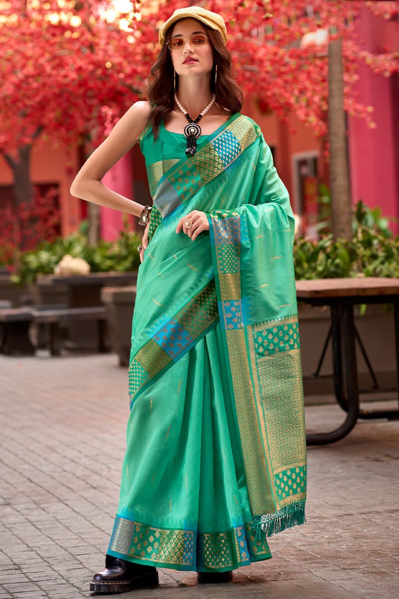 Capricious Sea Green Soft Banarasi Silk Saree With Charming Blouse Piece - Surats Fabric