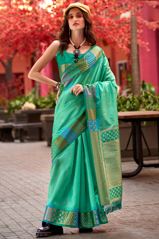 Capricious Sea Green Soft Banarasi Silk Saree With Charming Blouse Piece - Surats Fabric