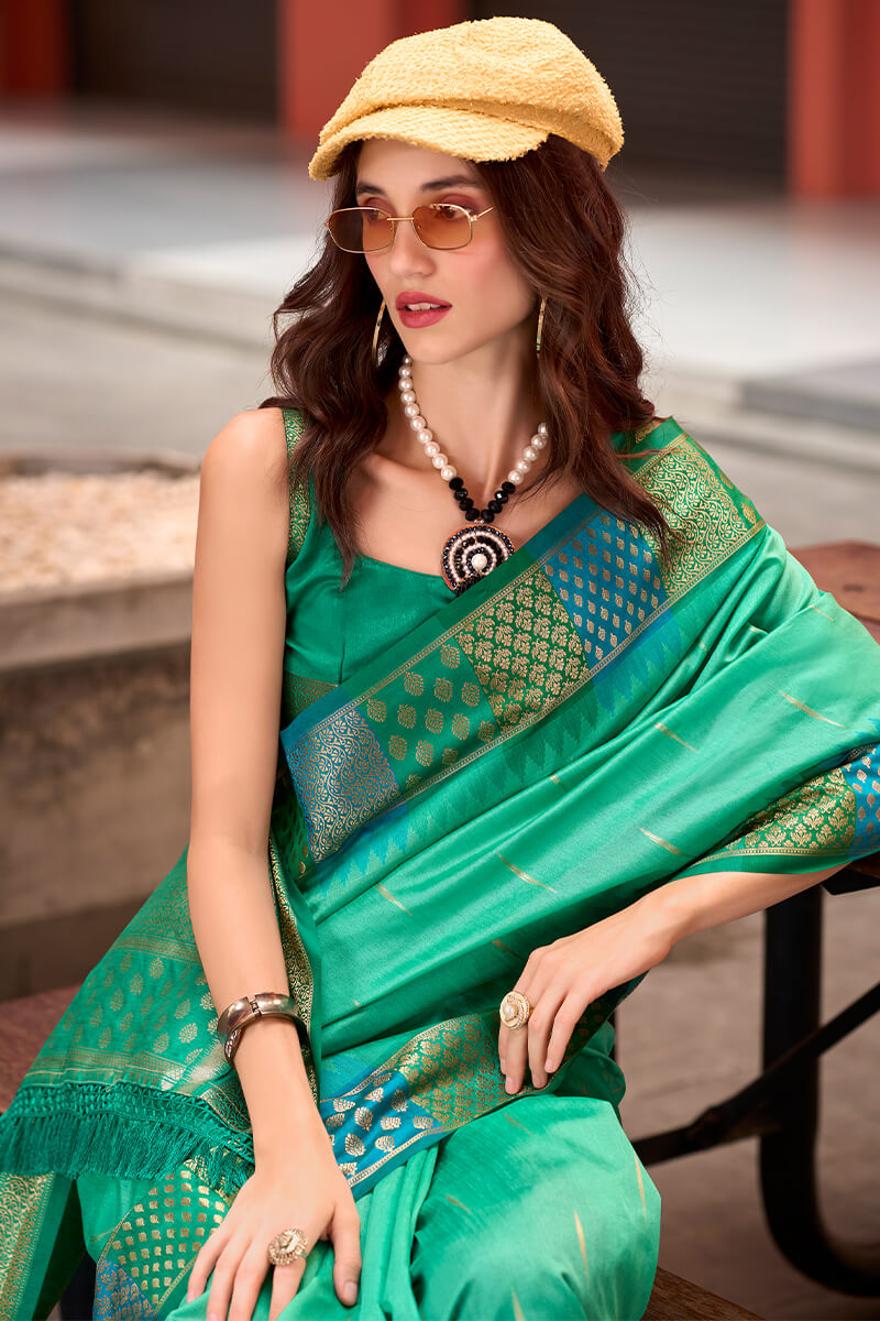 Capricious Sea Green Soft Banarasi Silk Saree With Charming Blouse Piece - Surats Fabric