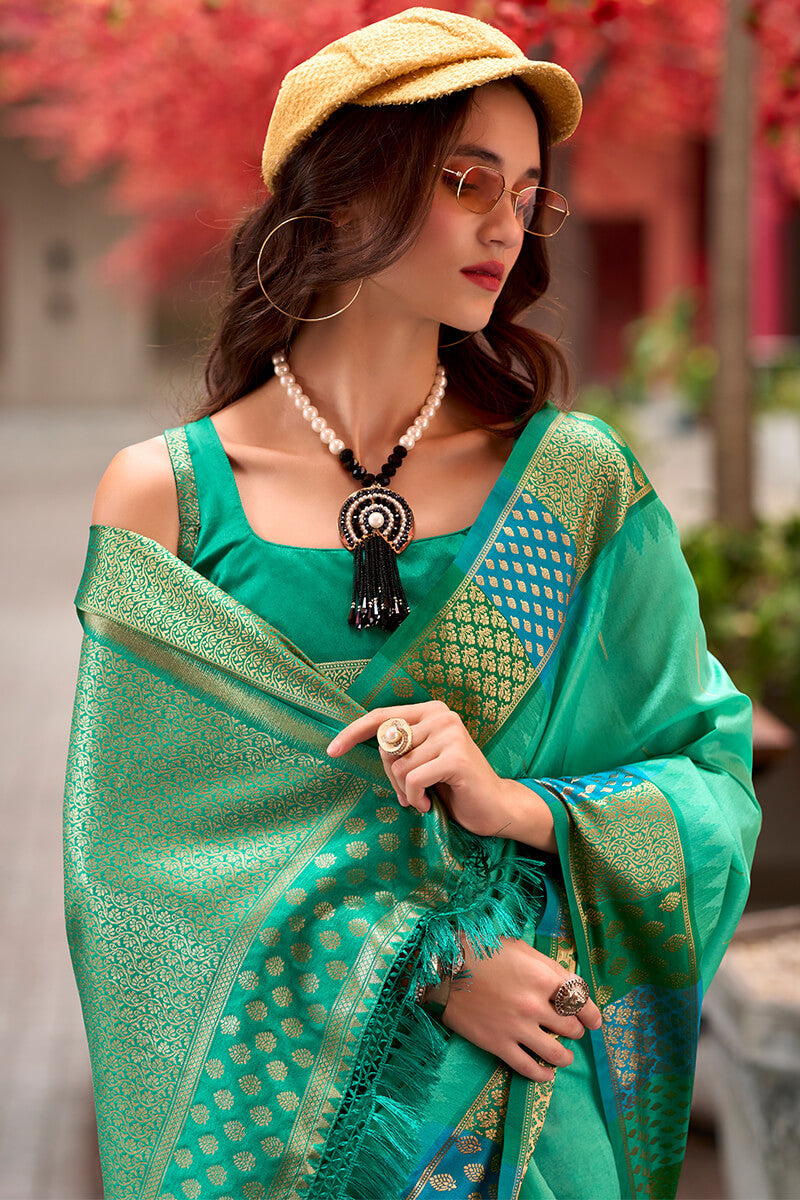 Capricious Sea Green Soft Banarasi Silk Saree With Charming Blouse Piece - Surats Fabric