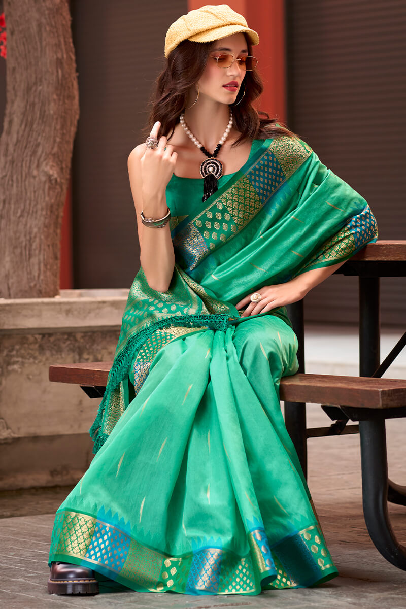 Capricious Sea Green Soft Banarasi Silk Saree With Charming Blouse Piece - Surats Fabric