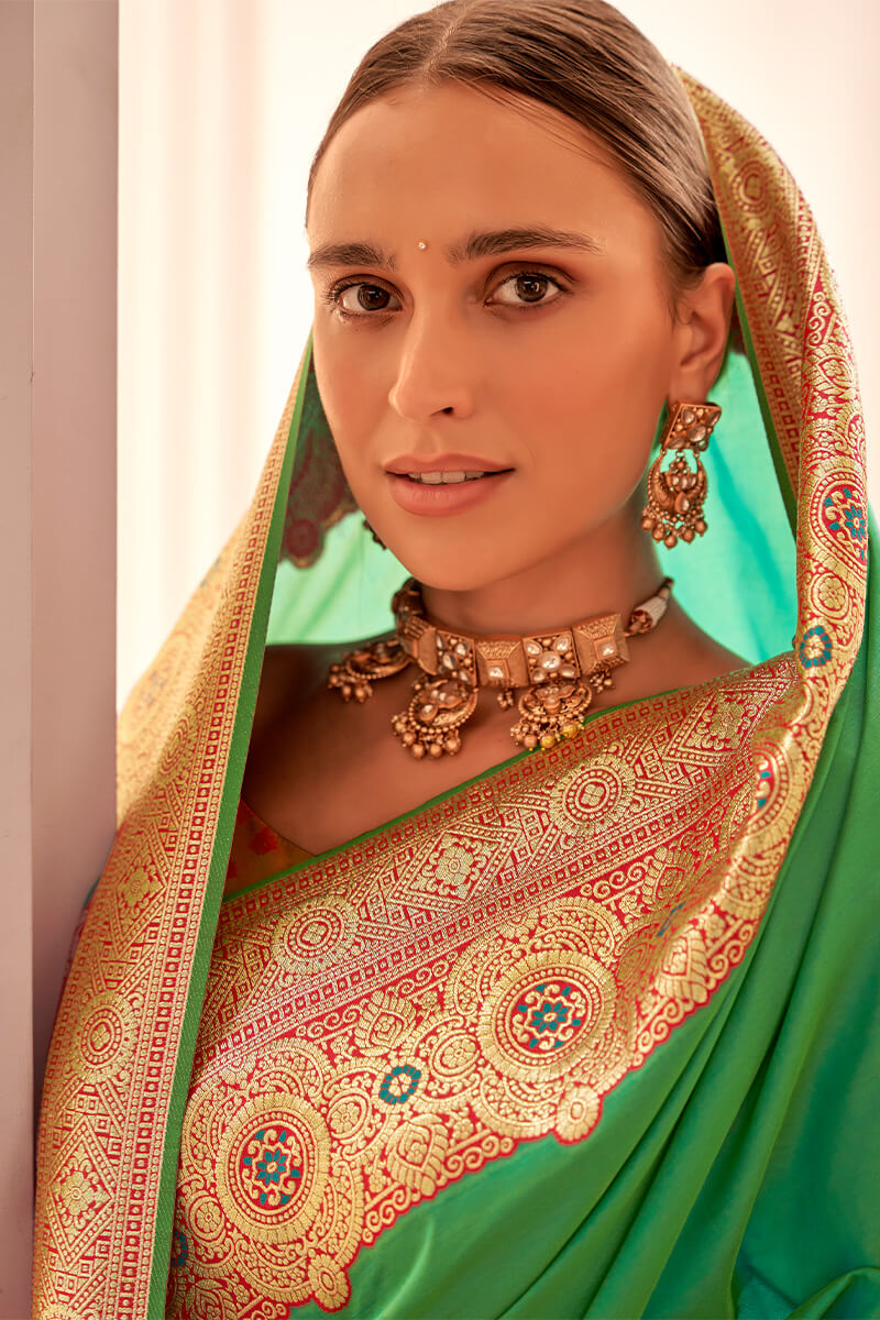 Capricious Sea Green Soft Banarasi Silk Saree With Invaluable Blouse Piece - Surats Fabric