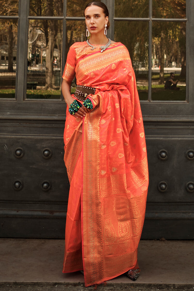 Appealing Orange Soft Banarasi Silk Saree With Groovy Blouse Piece - Surats Fabric