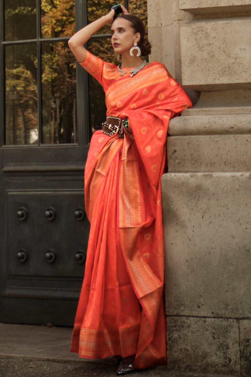 Appealing Orange Soft Banarasi Silk Saree With Groovy Blouse Piece - Surats Fabric