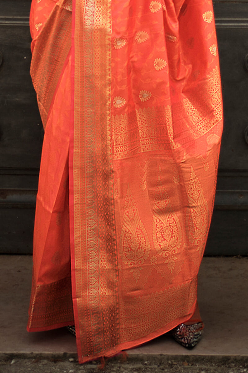 Appealing Orange Soft Banarasi Silk Saree With Groovy Blouse Piece - Surats Fabric