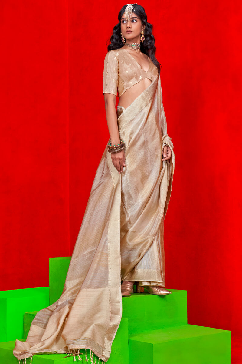 Captivating Beige Soft Banarasi Silk Saree With Prominent Blouse Piece - Surats Fabric